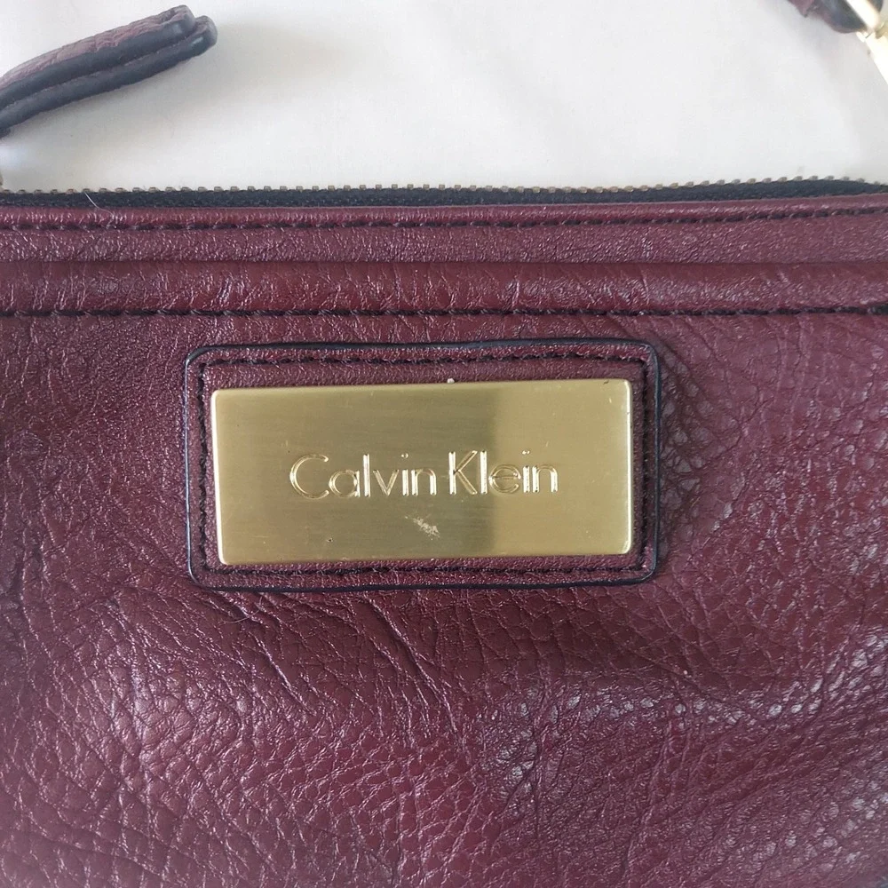 Calvin‎ Klein Burgundy Pebbled Faux Leather Wristlet Gold Hardware Bag
